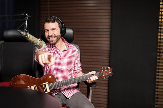 Popular male latin musician at radio show
