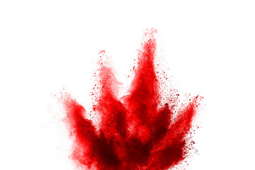 Red powder explosion on white background. Colored cloud. Colorful dust explode. Paint Holi.