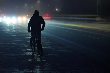 Fotobehang cyclist at night © Michael