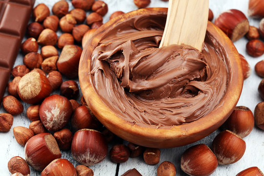 Homemade hazelnut chocolate spread in wooden bowl. Hazelnut Nougat cream