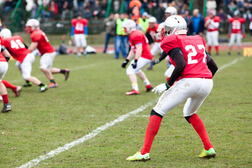 american football game - players in action