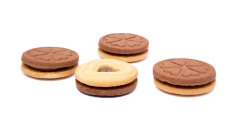 Chocolate heart in round biscuit isolated on white background