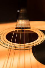 acoustic guitar in the light of the Sun