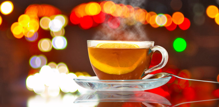image of cup with tea on blurred background