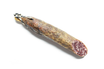 Piece of Iberian Salami Sausage (Salchichon Iberico)  isolated on white background. Iberian salchichon. Iberian pork meat.