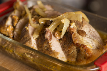 roasted meat with raisin nuts and onions