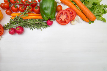 Variety of vegetables, on the white wooden table, top view, copy space, selective focus