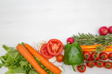 Variety of vegetables, on the white wooden table, top view, copy space, selective focus