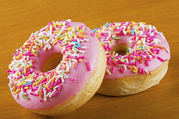 Close up of colorful and delicious donuts