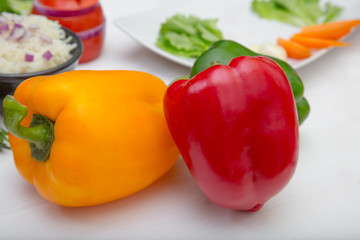 close-up peppers with rice inside bowl in the white background