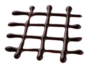 Chocolate sauce. Hot sweet liquid. Wave isolated on white background.