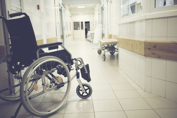 Wheel chair at corridor of hospital.