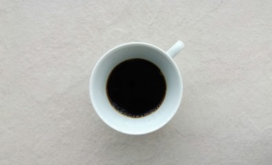 Porcelain cup with coffee