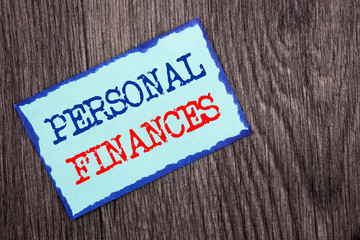 Writing text showing Personal Finances. Business photo showcasing Finance Financial Investment Plan For Success Wealth written on Blue Sticky Note Paper on the wooden background.