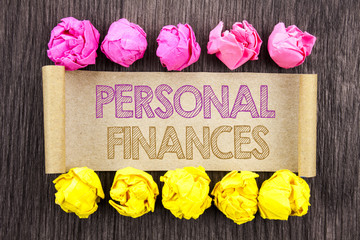 Writing text  Personal Finances. Concept meaning Finance Financial Investment Plan For Success Wealth written on sticky note paper with folded paper yellow and pink on the wooden background.