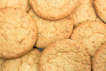 Cookies background. oatmeal biscuits texture background. Concept overeating, gluttony, unhealthy food