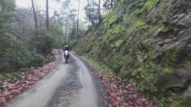 Riding dirt bike in a forest in Cyprus