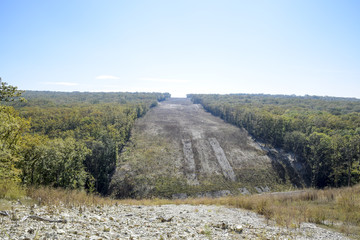 A clearing in the forest for the gas pipeline