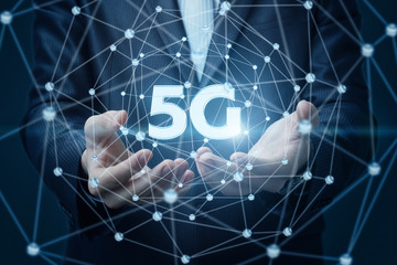Businessman showing symbol 5g.