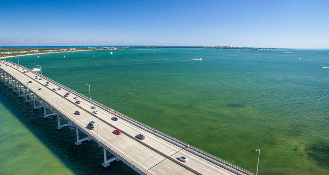 Aerial view of Rickebacker Causeway with car traffic