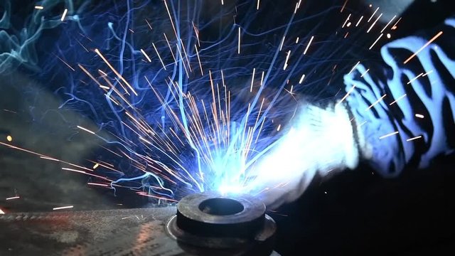 Welding. industrial arc welding work. slow motion