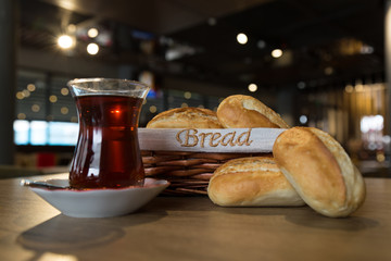 tea concept. tea ,bread and book on the wooden background. cafe concept.