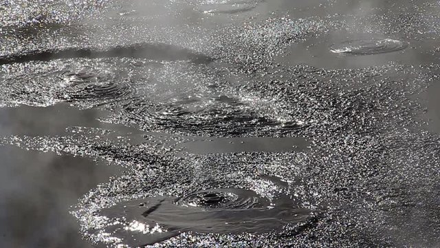 Slow motion geothermal mud pool at Rotorua, New Zealand. Rotorua's thermal mud is renowned as a skin care and beauty treatment. Boiling, bubbling steaming mud at Whakarewarewa Thermal Park.