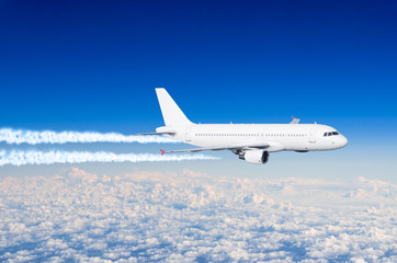 Fototapeta na wymiar White aircraft big two engines aviation airport contrail clouds.