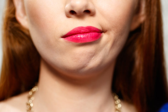 Facial Expressions Of Young Redhead Woman Closeup