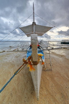 Balangay or bangka boat stranded on the beach. Punta Ballo-Sipalay-Philippines. 0330