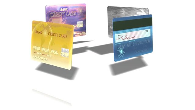 Generic credit cards form a house of cards, which collapses in slow motion. Symbolic of housing problems, debt, foreclosure, real estate unaffordability, economic recession, bankruptcy etc. 