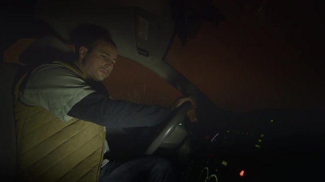 A man gets out of his car to urinate, and gets hit by a car. (Simulated)