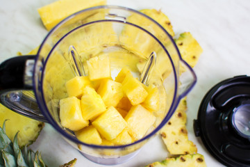 Pineapple slices in a blender