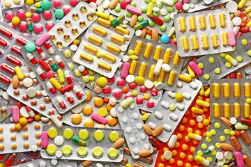 Pills and colorful blister packs