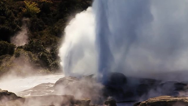 Slow motion: The Pohutu Geyser (right) and Prince of Wales Feathers Geyser (left, smaller) erupting at Whakarewarewa Thermal Park, Rotorua, New Zealand - one of NZ&rsquo;s top tourist attractions. Close-up.