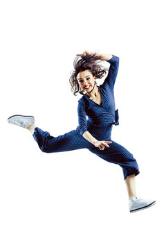 Full Length Portrait Of A Cheerful Woman Jumping Isolated On A White Background