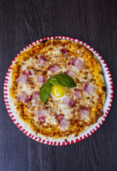 Pizza with bacon and egg