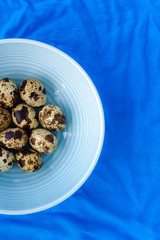 Quail Eggs in Blue Bowl