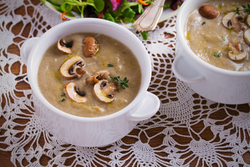 Creamy mushroom soup. Mushroom vegetable soup with thyme and parmesan cheese