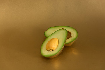 golden fruits and vegetables on a golden background
