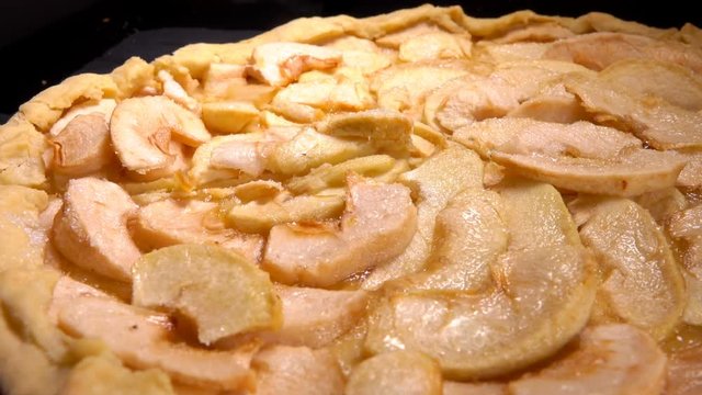Close uo of a piece of apple pie taken from a plate