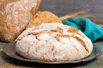 Farmers homemade organic wheat, barley and rye bread in assortment