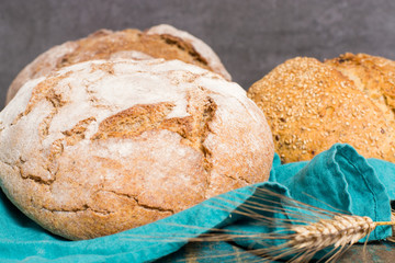 Farmers homemade organic wheat, barley and rye bread in assortment