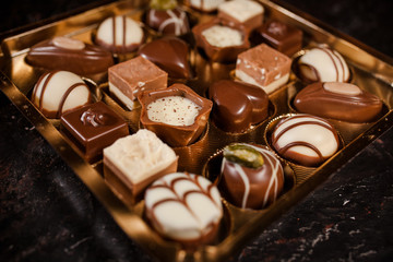chocolates in white, dark, and milk chocolate, variety of Chocolate Truffle