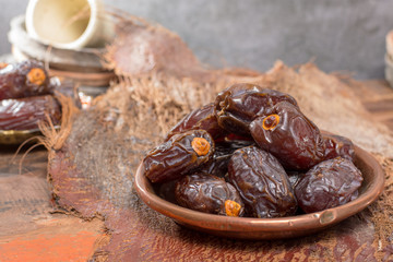 Traditional Middle East dessert, healthy food, big medjool dates fruits.