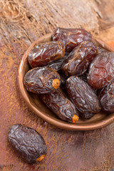 Traditional Middle East dessert, healthy food, big medjool dates fruits.