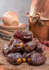 Traditional Middle East dessert, healthy food, big medjool dates fruits.