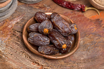 Traditional Middle East dessert, healthy food, big medjool dates fruits.