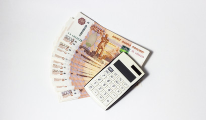 Lots of Money and a close-up calculator