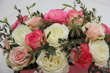 roses and exotic flower bouquet on white background, close 